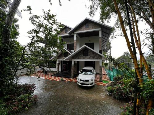Anachal House | Cherry blossom homestays Munnar 3BHK