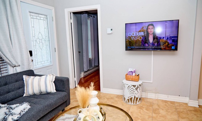 Saint-Edmond Apartment | Chic3-Bedroom Private Garden, Parking- Self check-in- 35Min from Montréal!