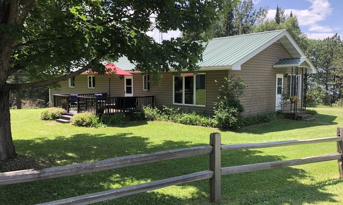 Stambaugh House | Chicaugon Lake home close to great golf and fishing opportunities.