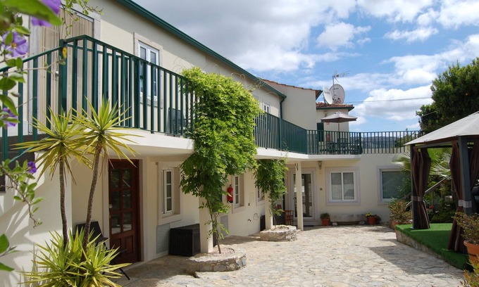 Penela Apartment | Child and pet friendly apartment with open plan lounge, kitchen and dining area.