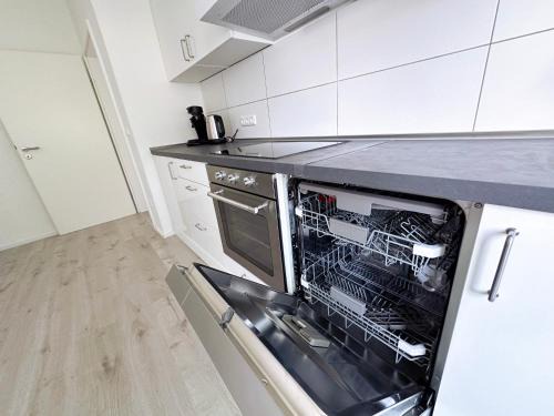 Frohnhausen Apartment | City Apartment with WIFI, Kitchen and 4K TV