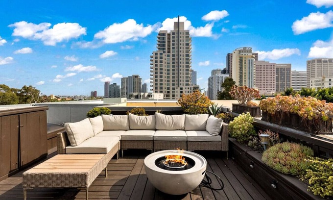 Cortez Hill Apartment | City Lights & Rooftop Nights by Rather Be Properties