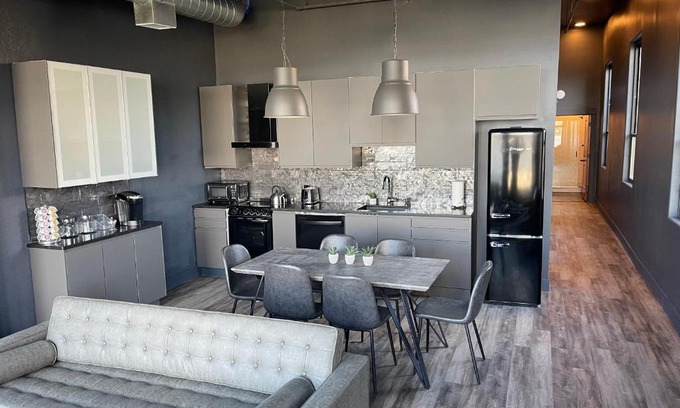 West Main Historic District Apartment | City Loft Escape with River Views! By Hollyhock