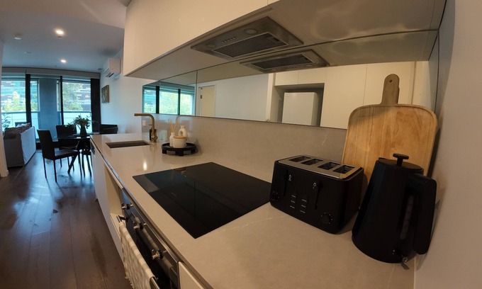 Reid Apartment | City Retreat with Rooftop Pool, Private Parking & City Views