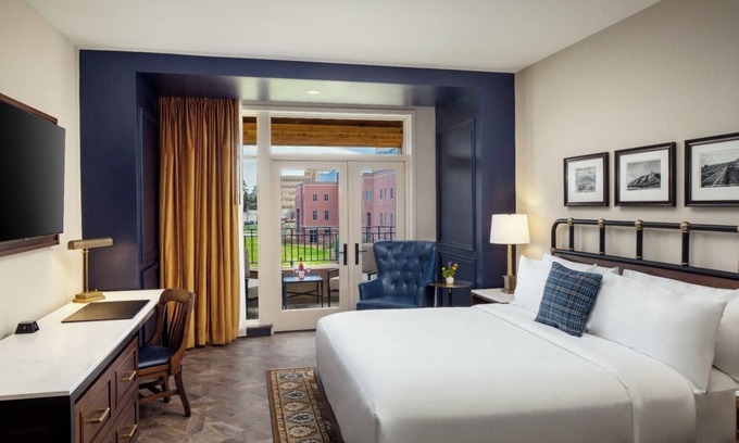 Fitzsimons Hotel | City Sophistication: Large Suite near Southlands Shopping Center! Dogs Allowed!