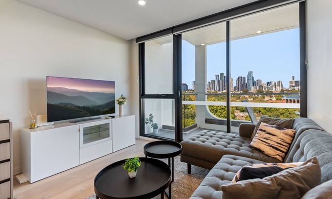 North Melbourne Apartment | City Views & Inner-North Cool at Your Door
