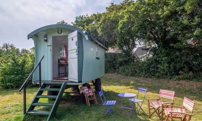 Brandeston Apartment | Clarabelle is a beautiful shepherd's hut set in a blooming kitchen garden