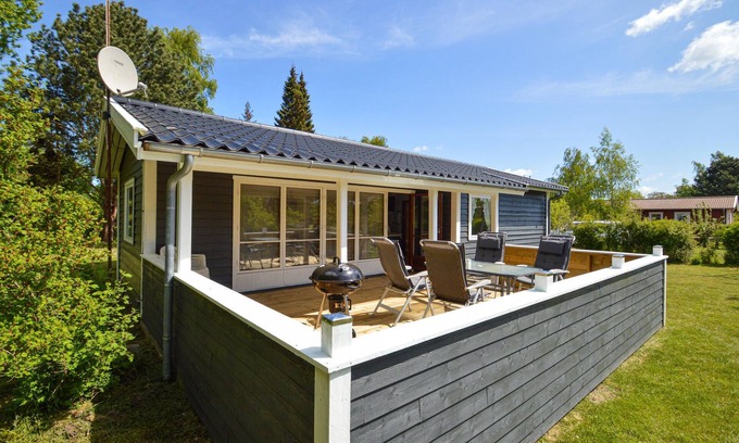 Næsby Strand House | Classic, Danish cottage near the water.
