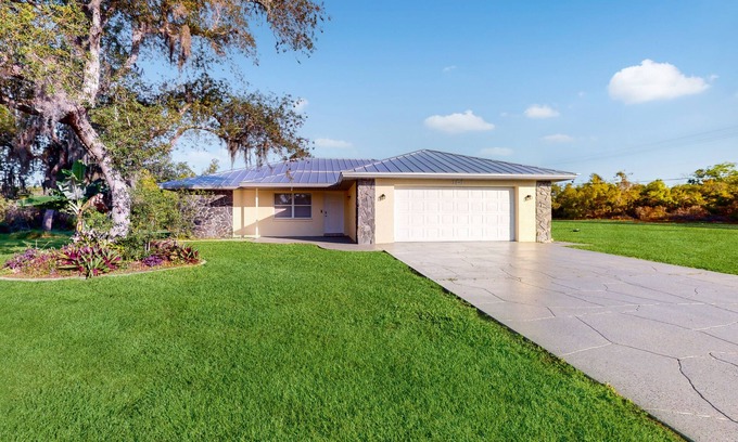 Lake Placid House | Classic home close to Lake Placid with modern updates, W/D, AC, & patio