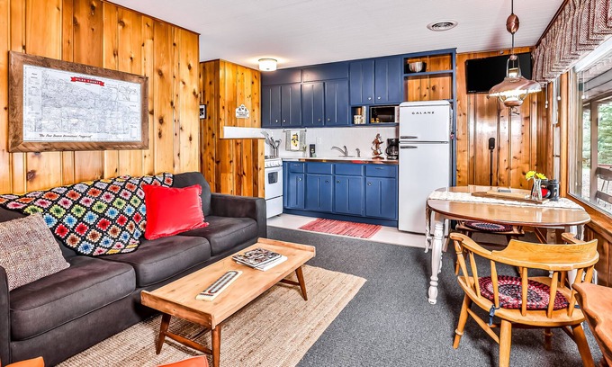 Presque Isle House | Classic, lakefront suite at a vintage resort with communal dock, firepit & views
