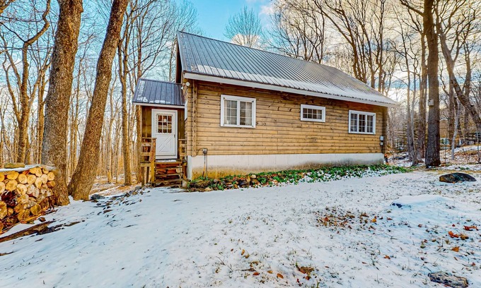 Wilmington Cabin | Classic Vermont cabin with forest views, woodstove, pools, hot tub & gym