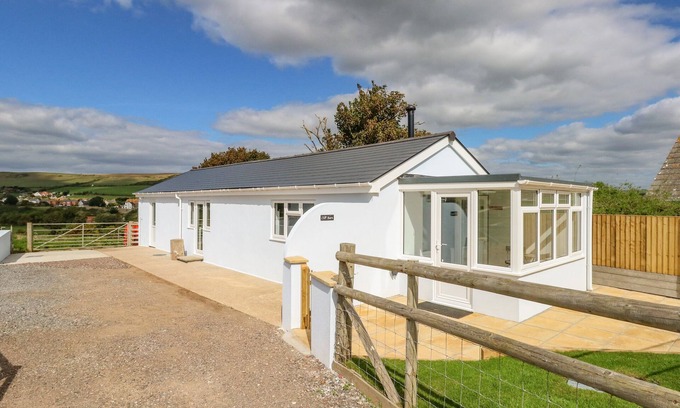 Bridport Cottage | CLIFF BARN, pet friendly, with open fire in Burton Bradstock