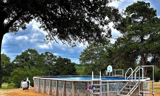 Red Rock House | Close to COTA, Large POOL, Fun Relaxing Getaways. EXCLUSIVE use of the property.