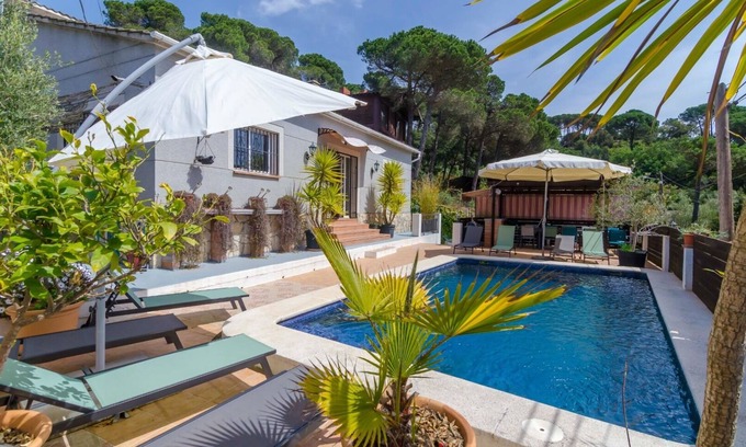 Vidreres Villa | Club Villamar - Experience serene luxury at a tranquil villa retreat with a private pool, modern .