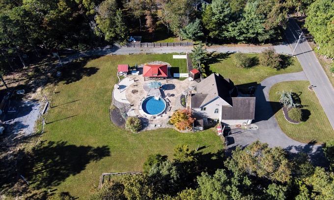 Milmay Other | ClubDivot - A Modern Farm Style Home with Pool and Backyard Bar