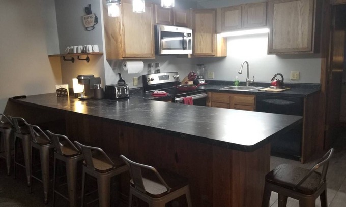 Chatham Apartment | Coalwood Trail-Large Group Unit #1-on snowmobile trail 8 near Pictured Rocks