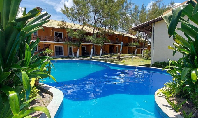 Arembepe Condo | COARE0100 - Pé na areia! Uma paisagem incrível!