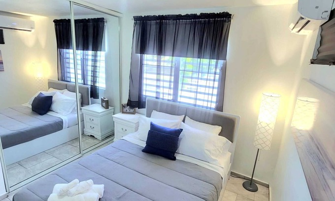 Levittown Apartment | Coastal Comforts: Shop, Dine, and Beach - All Within Reach!