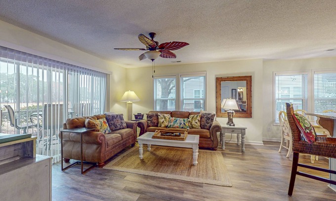 St. James Condo | Coastal Condo with golf course view and shared pool access