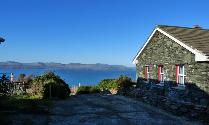 Kells House | Coastal Cottage with magnificent sea and mountains.