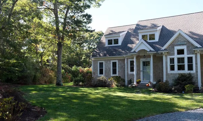 Cotuit House | Coastal Retreat: Kayaks Gardens & Gourmet Kitchen