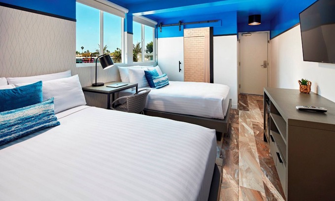 North Pacific Beach Hotel | Coastal Retreat: Modern Room Brimming with Ocean Ambiance