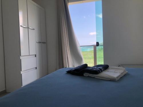 Morro das Pedras Apartment | Cobertura com churrasqueira frente mar!