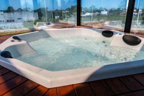 Campeche Sul Apartment | Cobertura com Hidromassagem na praia do Campeche