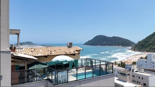 Tombo Apartment | Cobertura Luxuosa, pe na areia - Exclusividade na Praia do Tombo, Guarujá, a Mais Premiada com Bandeira Azul no Brasil
