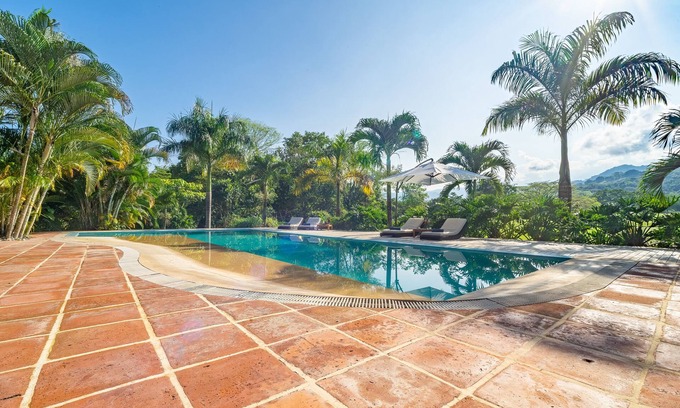 Anapoima Villa | Colombian Dream Getaway with Clay Tennis Court, Swimming Pools, Views and more.