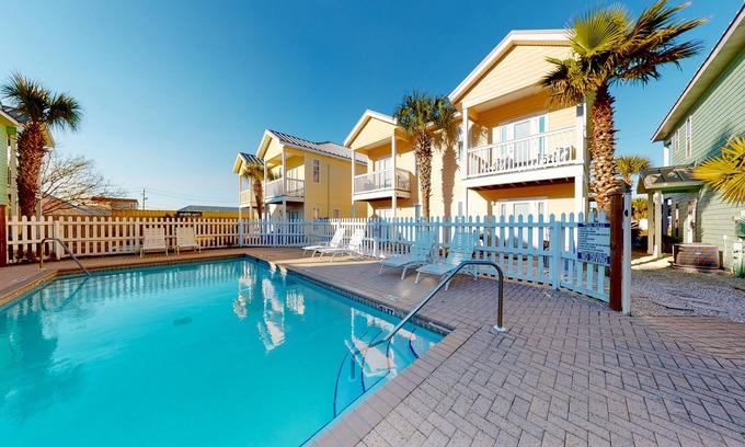 Sago Park Townhomes House | Colorful Beach House with Outdoor Pool, WiFi, Washer/Dryer, & Central A/C