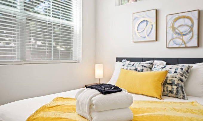 Southeast Boise House | Colorful Canvas: Relax in Grey, Yellow, and Blue