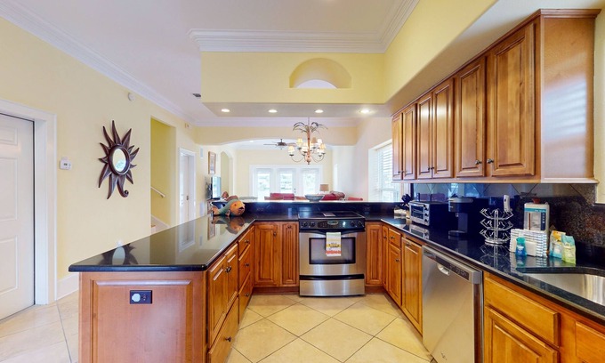 Sunset Pass House | Colorful end unit townhome with resort amenities, sound views, W/D, & AC