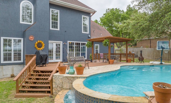 Castroville House | Come enjoy our peaceful house oasis that features a backyard patio with a pool!