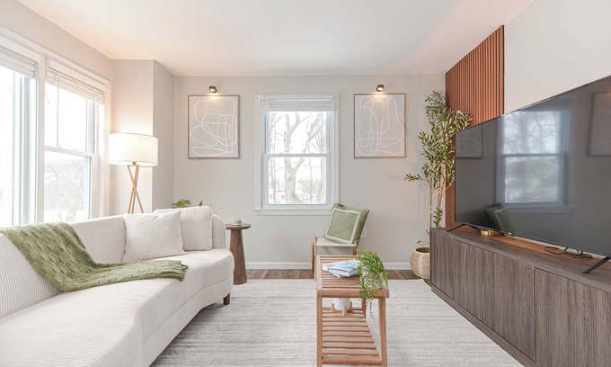 Lowell Apartment | Comfort Oasis with Private Garage. Steps from UMass Lowell & 35 min from Boston