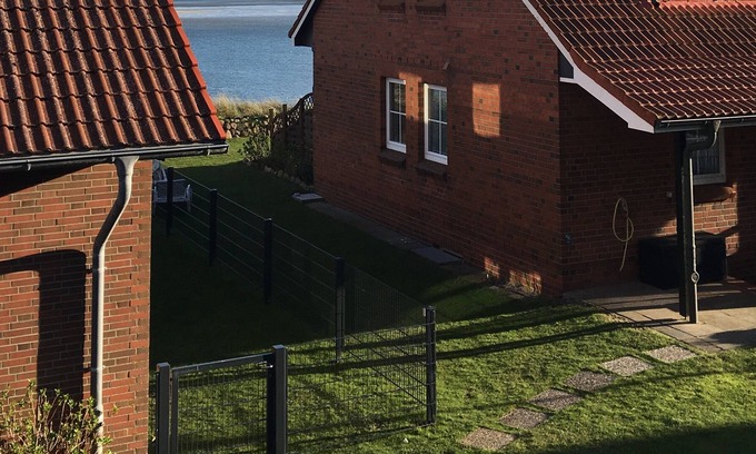 Wittduen Apartment | Comfortable apartment with sea views close to the beach and in a quiet location