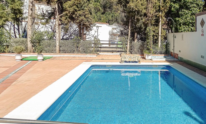 Benaojan Apartment | Comfortable and compact apartment in Ribera del Guadiaro apartment complex with community pool.