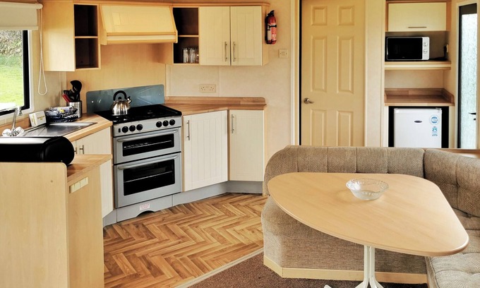 Ludchurch House | Comfortable and spacious 12ft-wide caravan with one double and two twin.