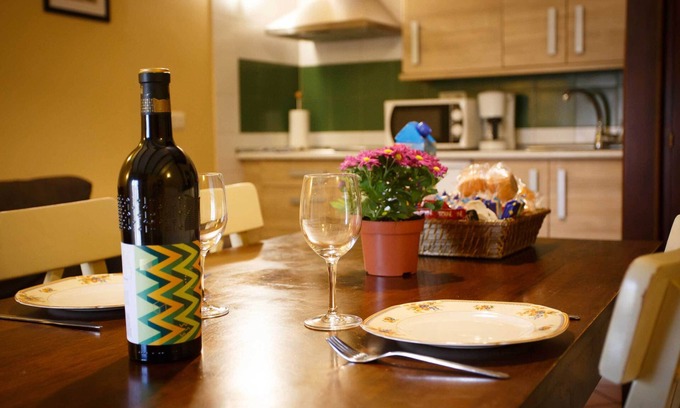 Robregordo Ski Chalet | Comfortable bedroom apartment sofa bed and fireplace on the first floor