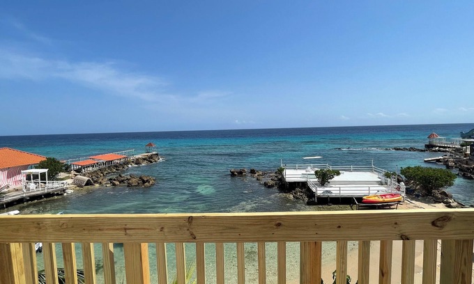 Stewart Town Condo | Comfortable, Bright Condo Steps Away From the Beach