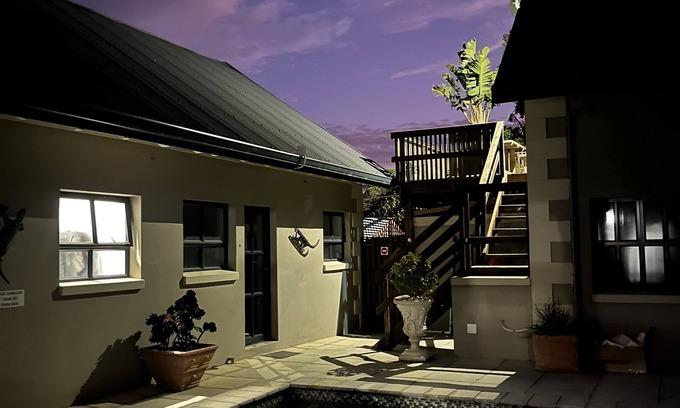 Plettenberg Bay Cottage | Comfortable Large Country Home sleeps 7 with 4 large bedrooms, private garden.