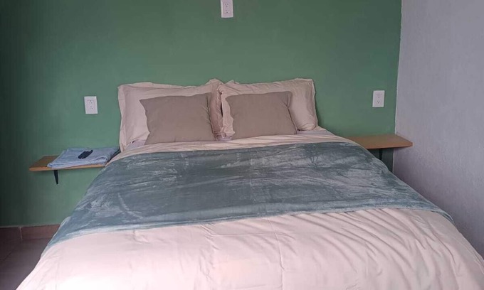 Queretaro Apartment | Comfortable room with private bathroom next to plaza candiles in Querétaro