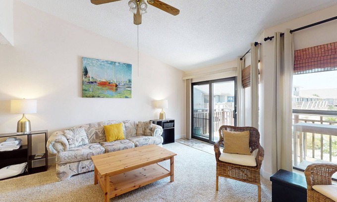East End House | Comfortable townhome steps from beach with pool access, balcony, & W/D