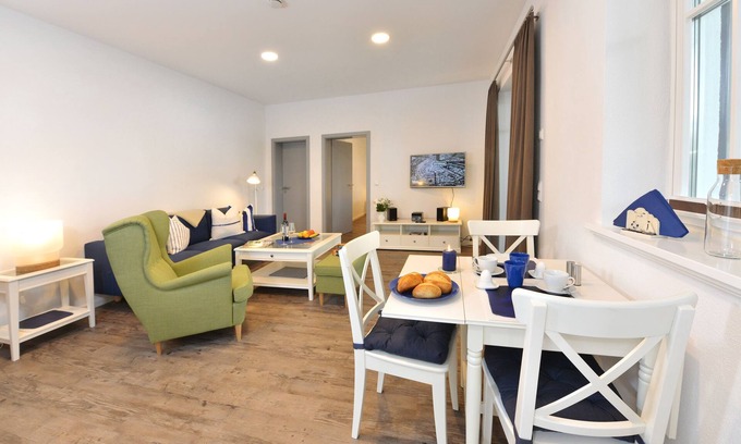 Ralswiek Apartment | Comfortable vacation apartment with sea view and terrace in the Blue House in Ralswiek