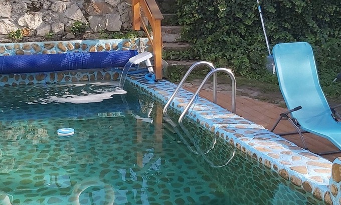Unguriu Villa | Comfortable villa with a private pool and gorgeous orchard.