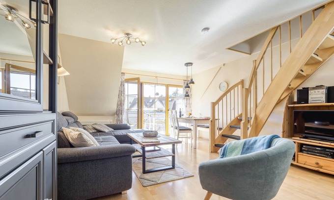 Zingst Apartment | Comfortable Windrose vacation apartment with balcony, pool and garden view in Zingst