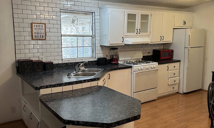 Kirtland House | Comfy country home for the whole family with private patio and BBQ.
