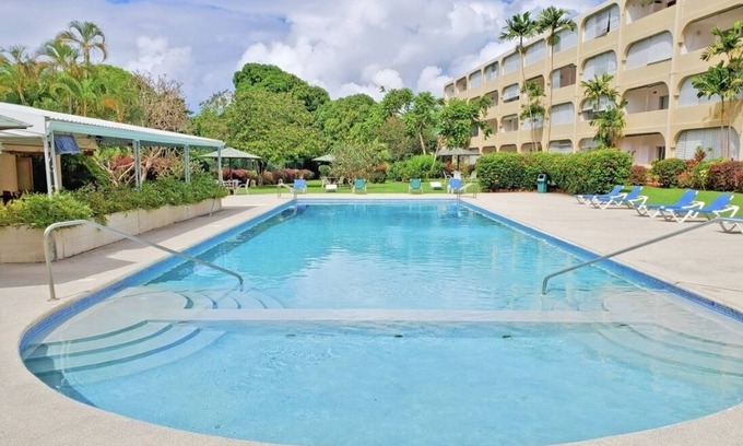 Sunset Crest Apartment | Comfy & peaceful apartment in tropical gardens with pool. 7mins walk to beach!