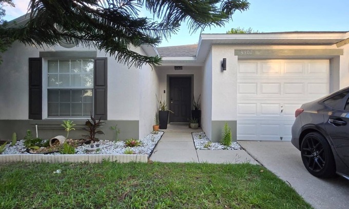 Buena Ventura Lakes House | Comfy room with private bathroom