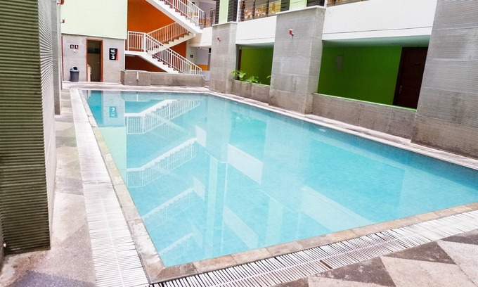 Siwalankerto Apartment | Comfy Studio at High Point Serviced Apartment